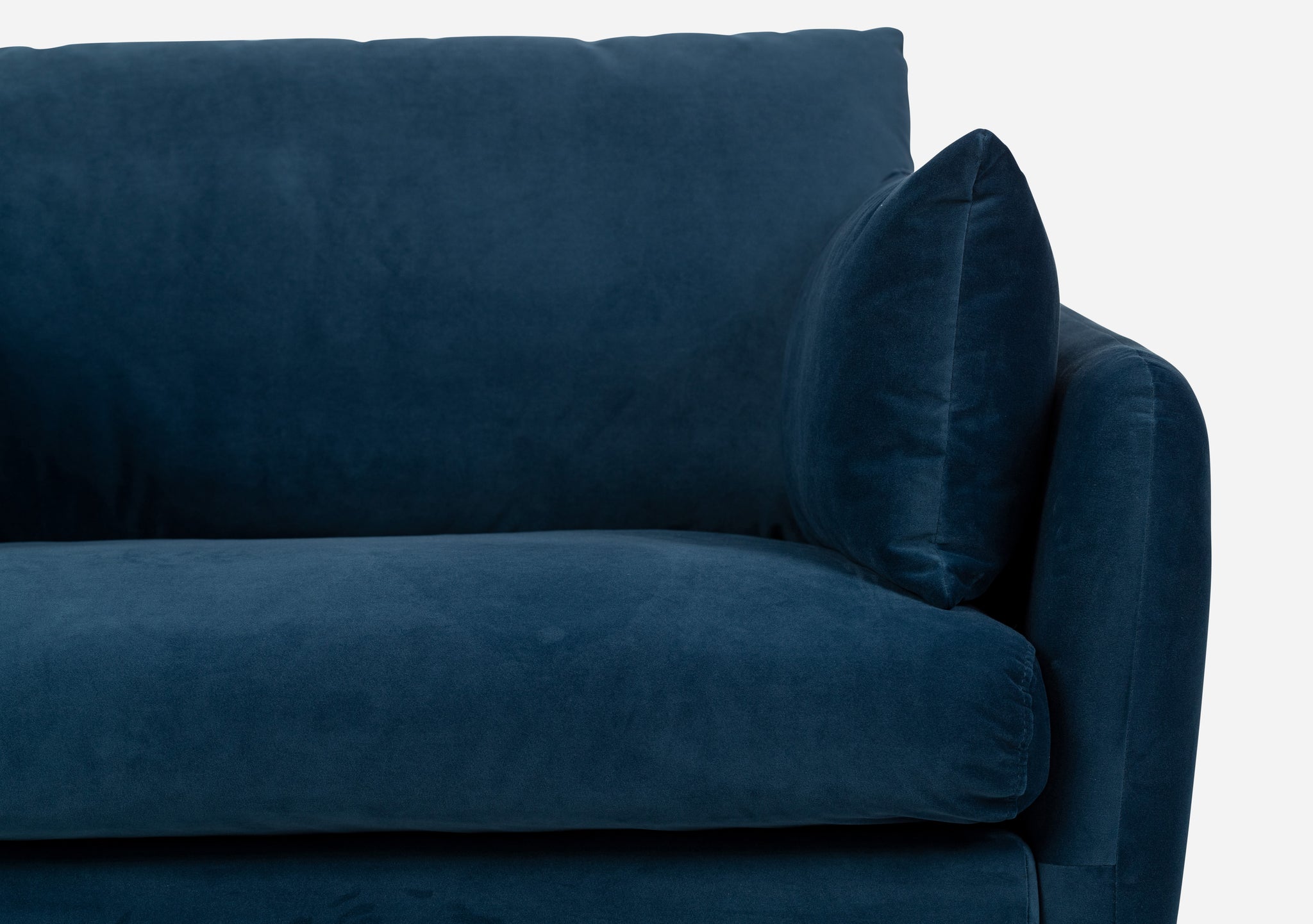 park sofa shown in blue velvet with gold legs