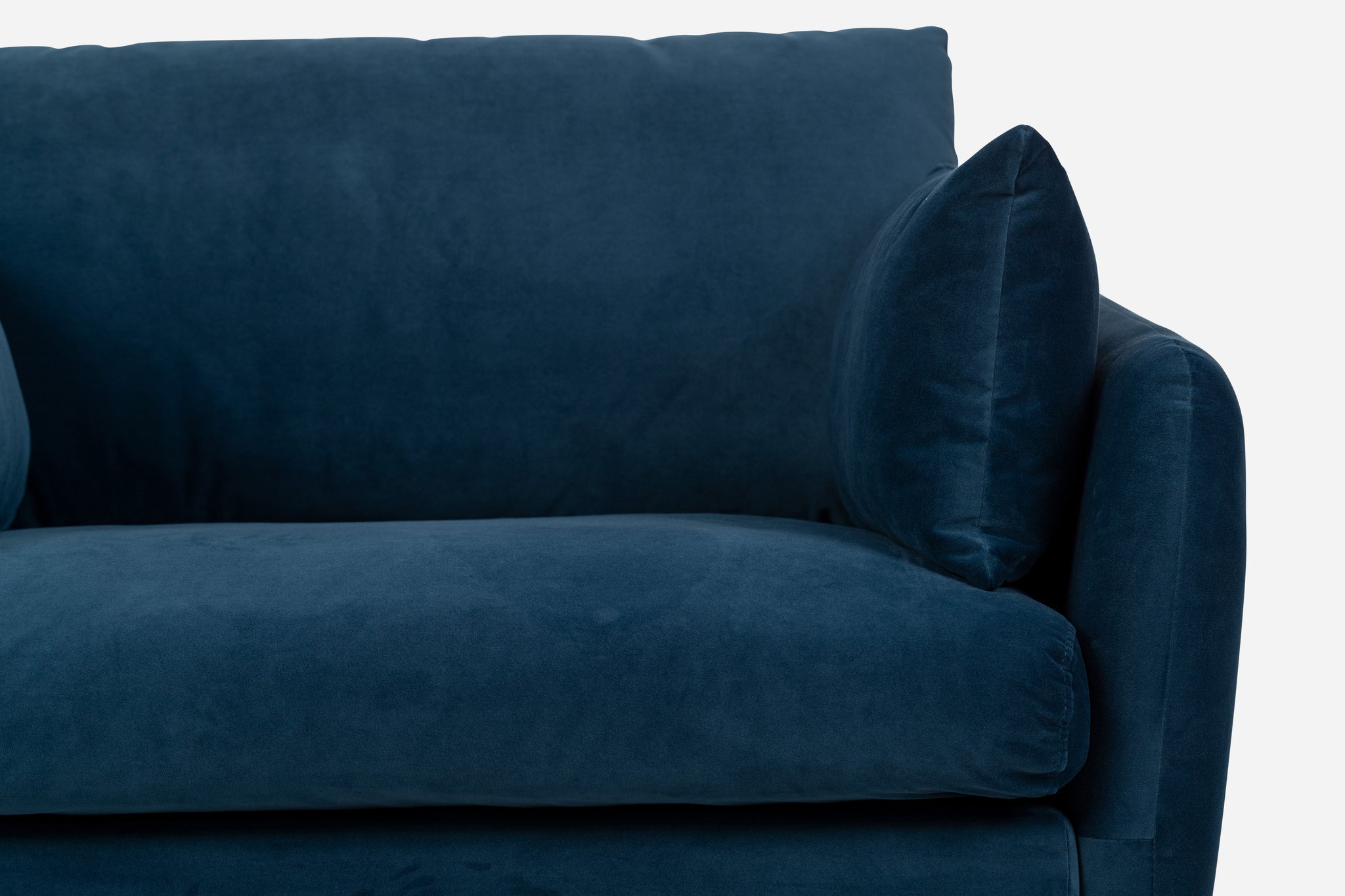 park sofa shown in blue velvet with black legs