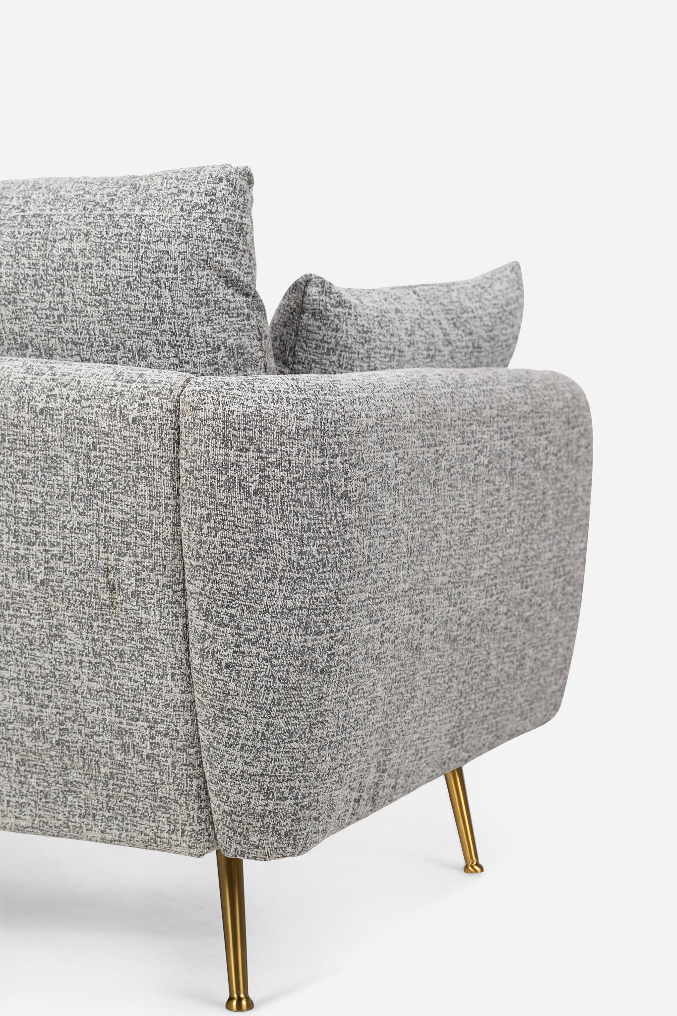 park sofa shown in grey fabric with gold legs