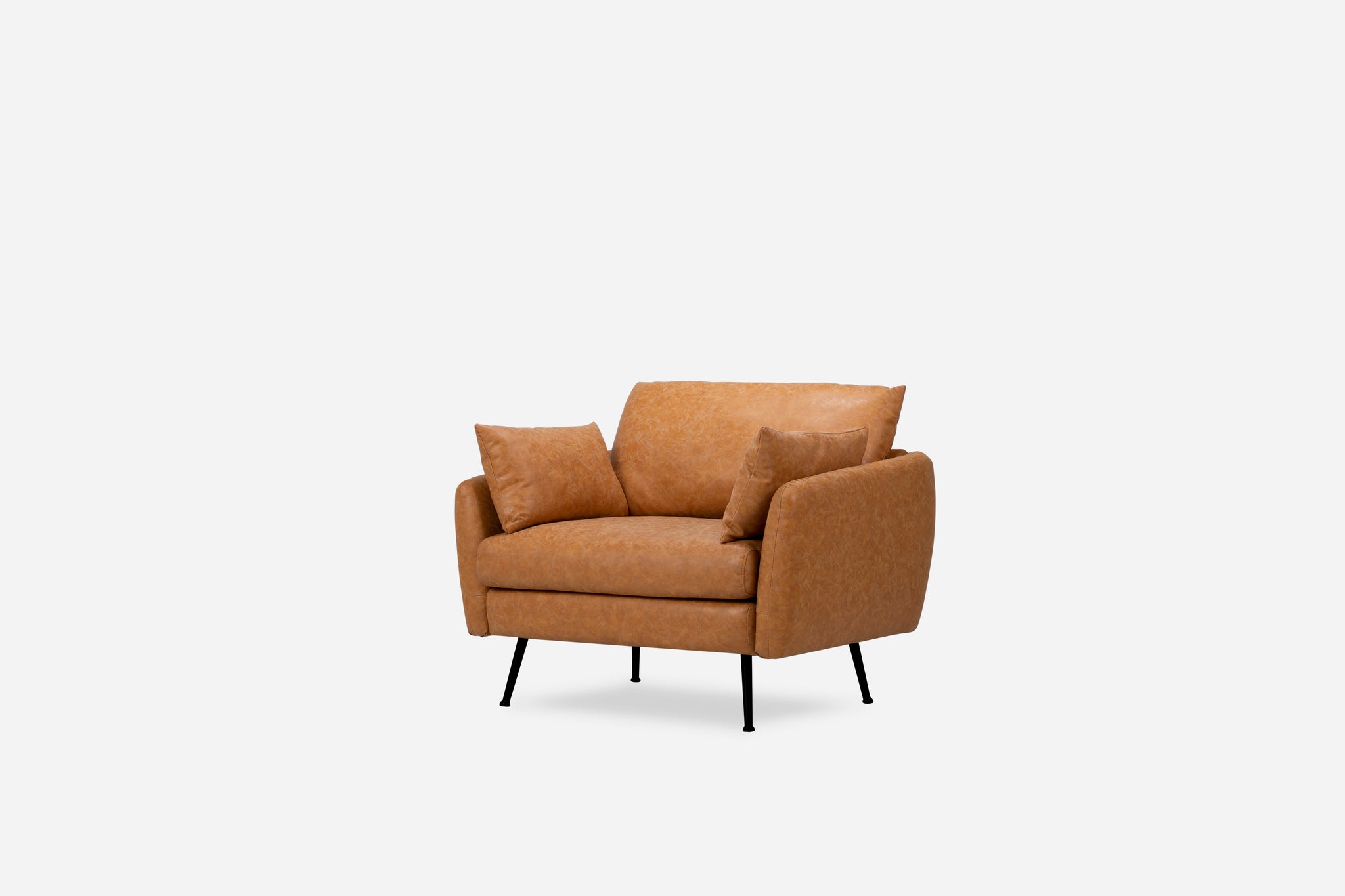 park armchair shown in distressed vegan leather with black legs