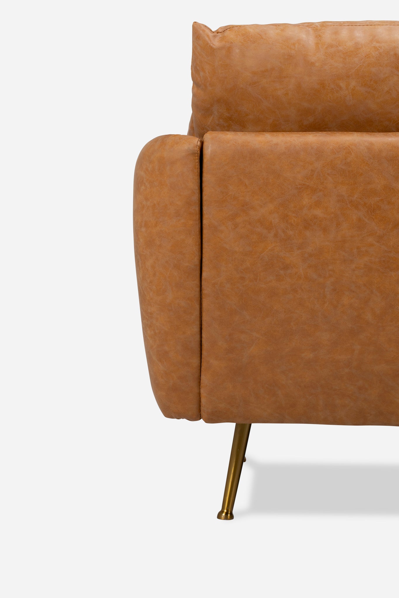 park armchair shown in distressed vegan leather with gold legs