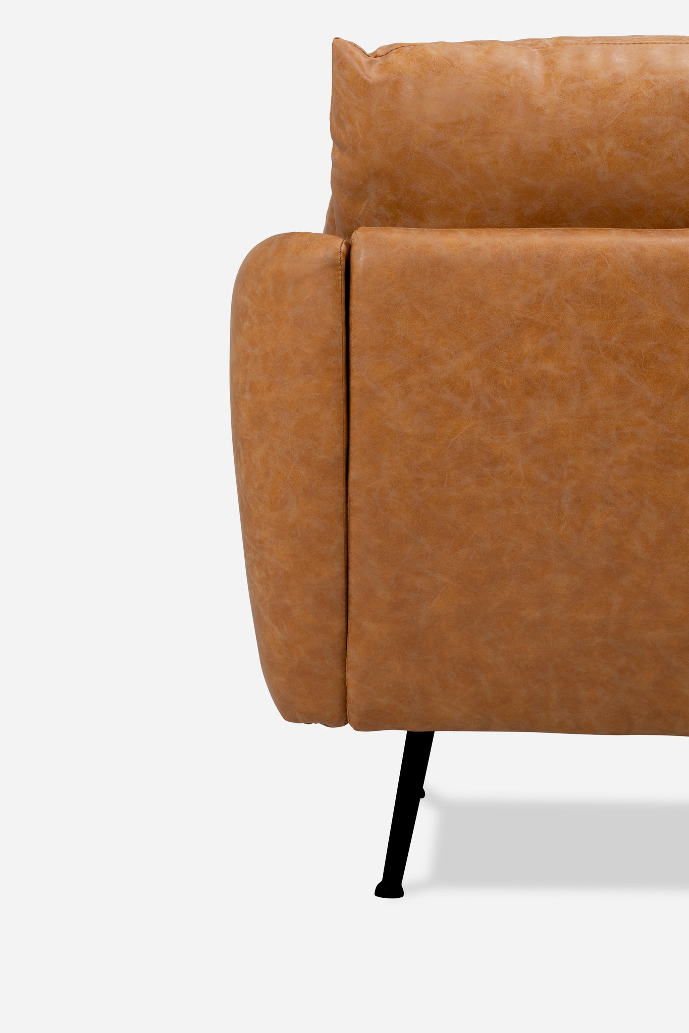 park sofa shown in distressed vegan leather with black legs