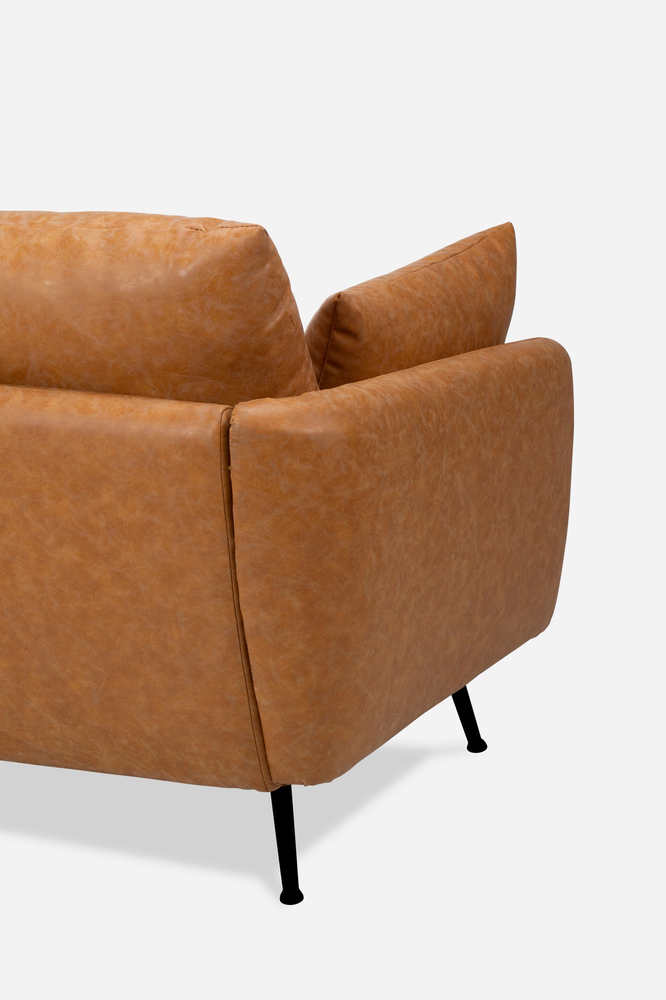 park sectional sofa shown in distressed vegan leather with black legs right facing