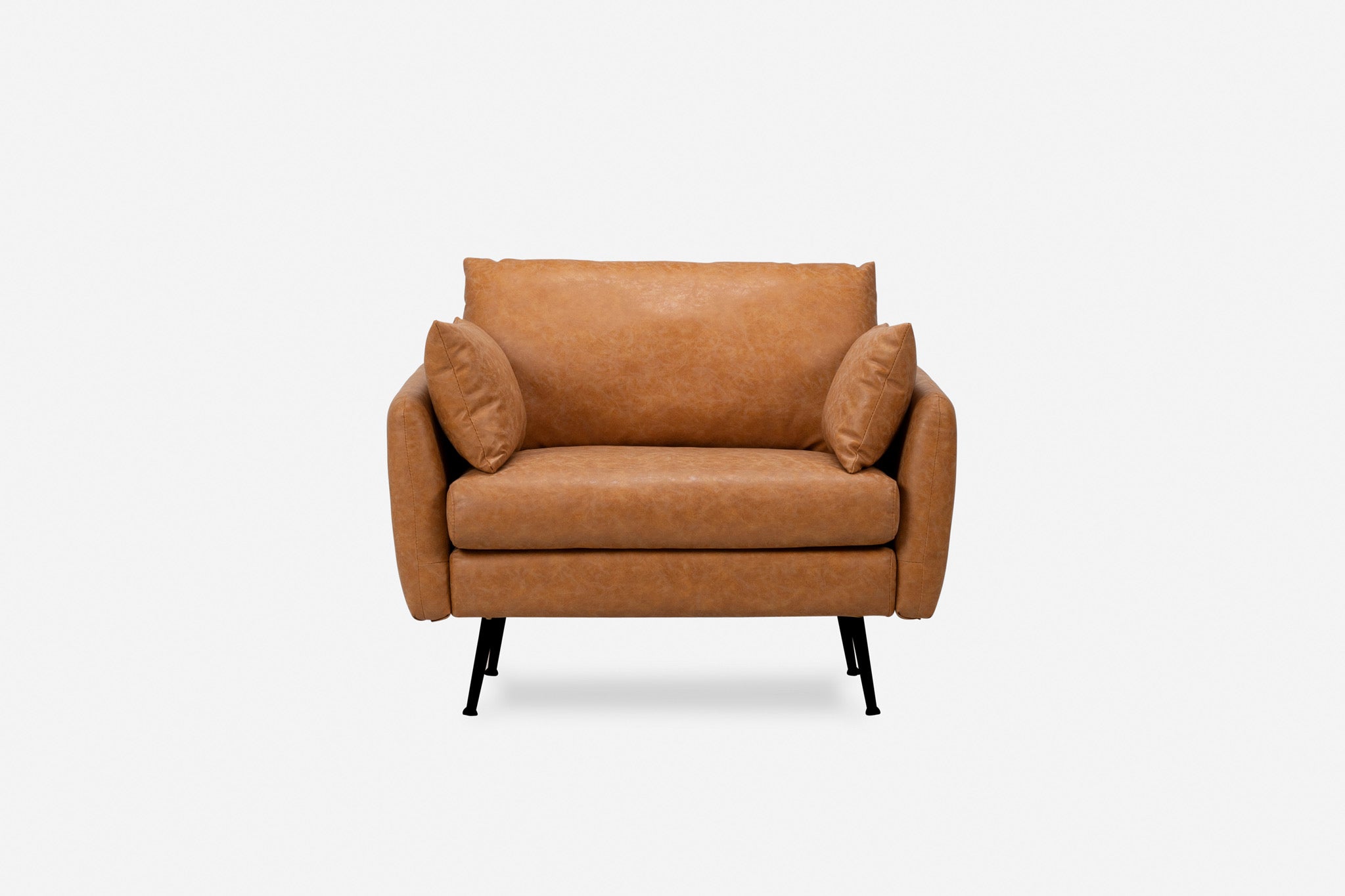 park armchair shown in distressed vegan leather with black legs