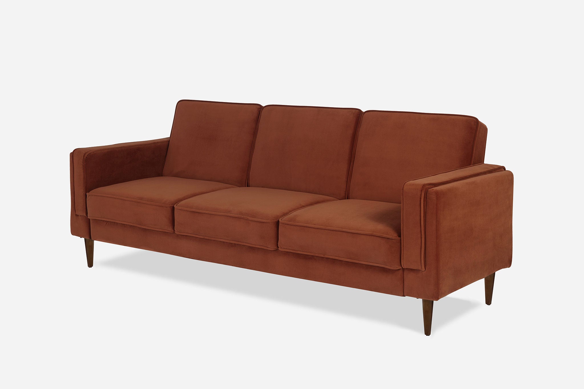 side view of the albany sleeper sofa in rust velvet and walnut legs