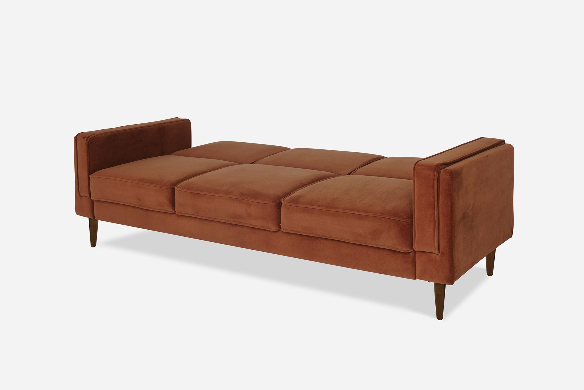 side view of the albany sleeper sofa as a bed in rust velvet and walnut legs