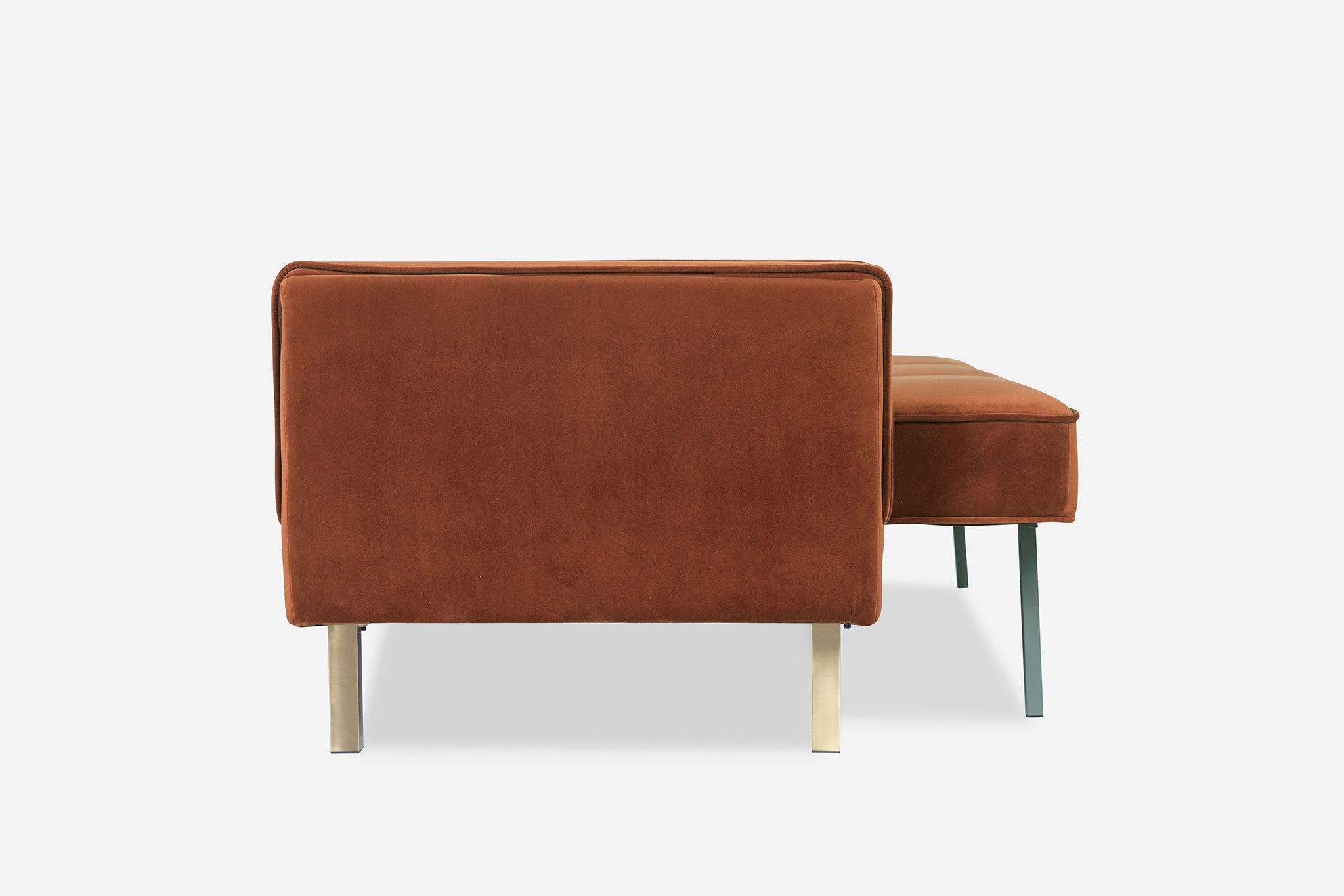 lateral view of the albany sleeper sofa as a bed in rust velvet and gold legs