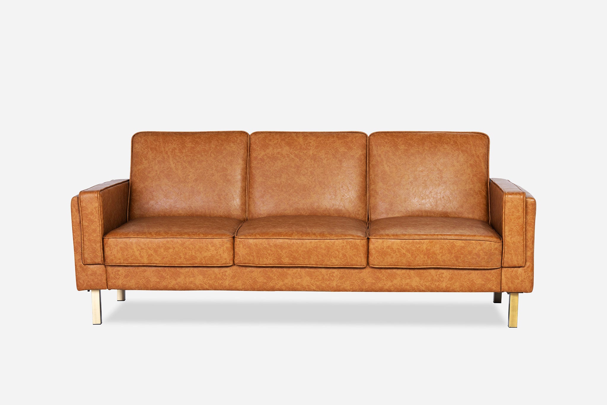front view of the albany sleeper sofa in vegan leather with gold legs