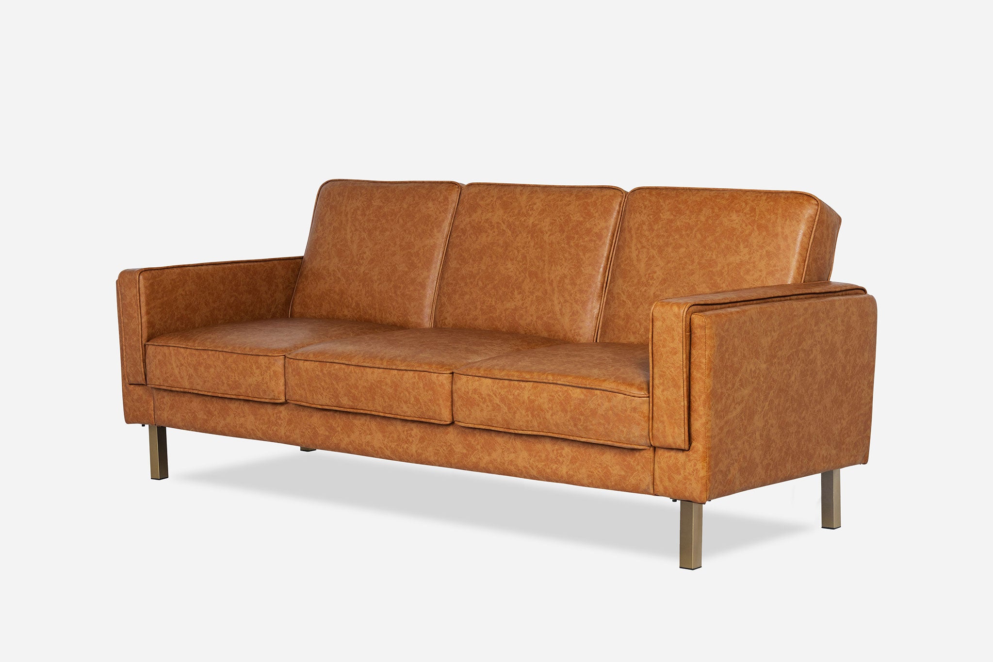 side view of the albany sleeper sofa in vegan leather with gold legs