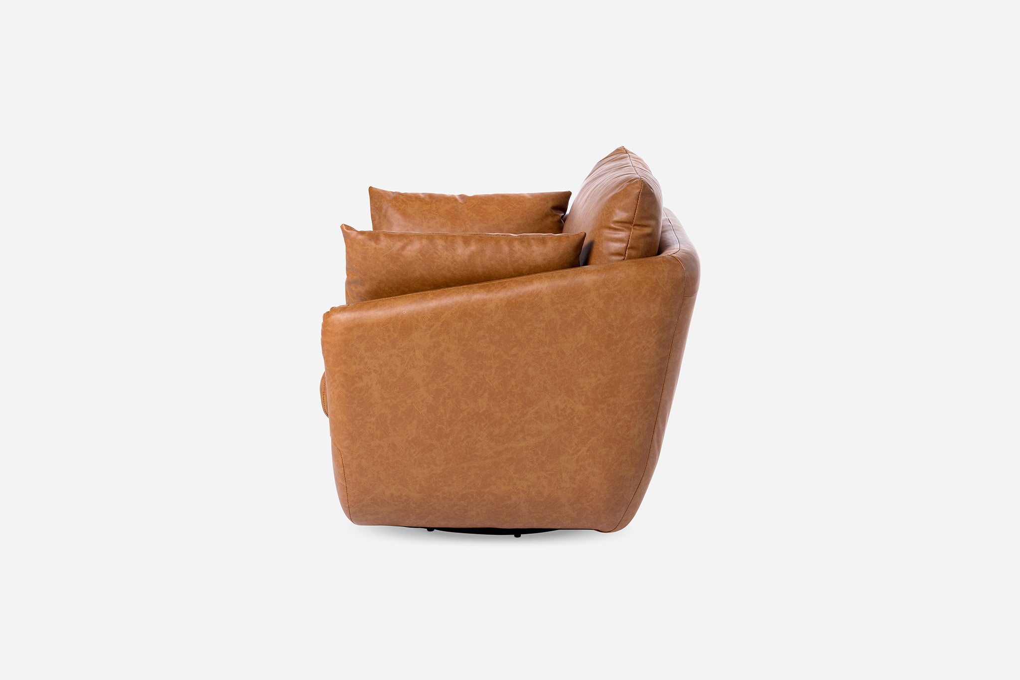 lateral view of the park swivel armchair in distressed vegan leather