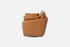distressed vegan leather | Lateral view of the Park swivel armchair in distressed vegan leather