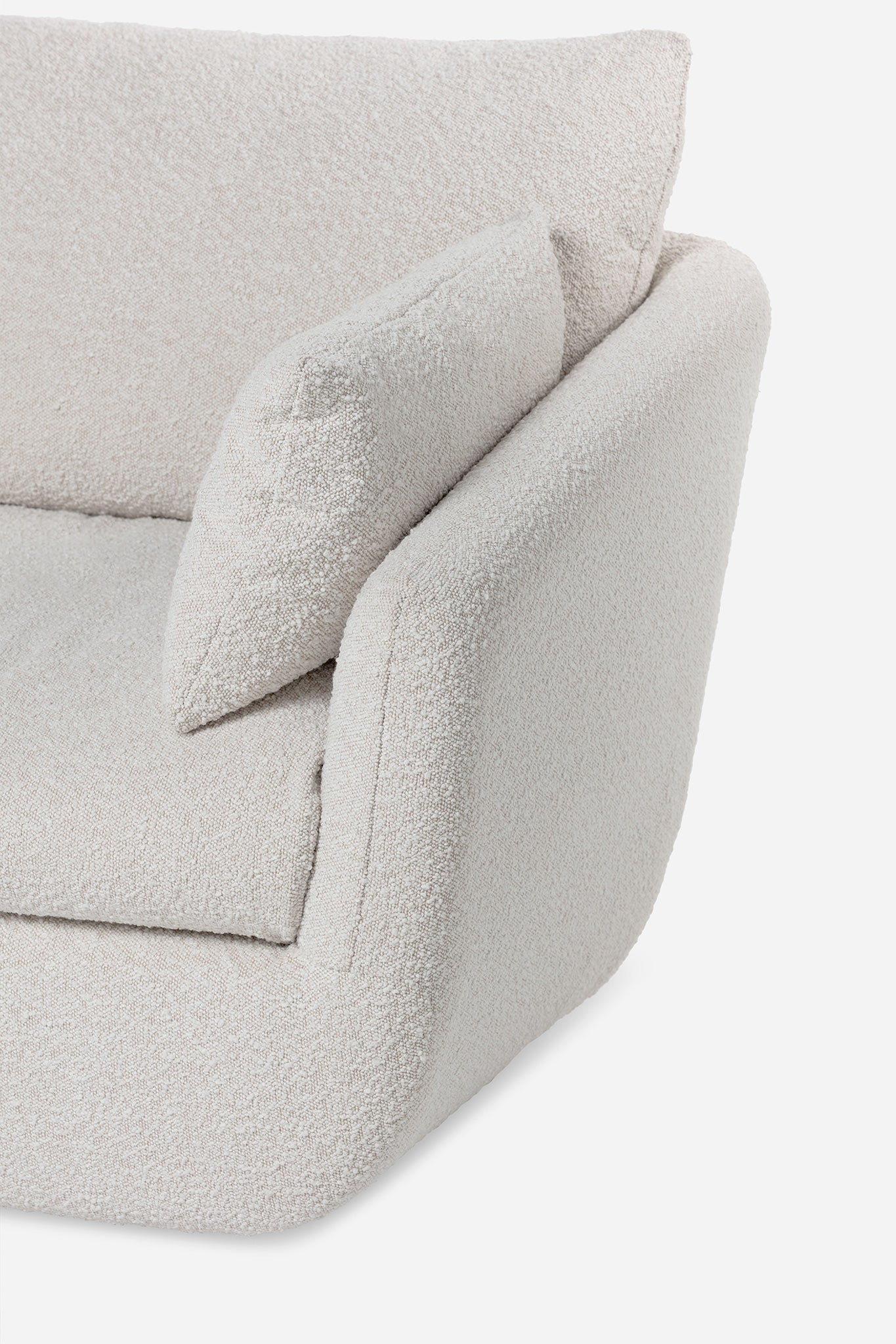 detail of the park swivel armchair in bouclé