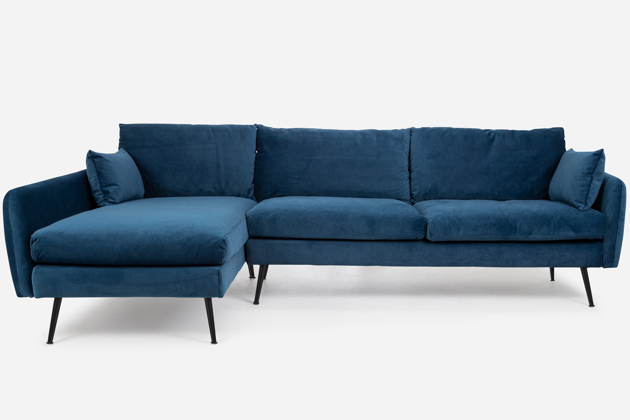 park sectional sofa shown in blue velvet with black legs left facing