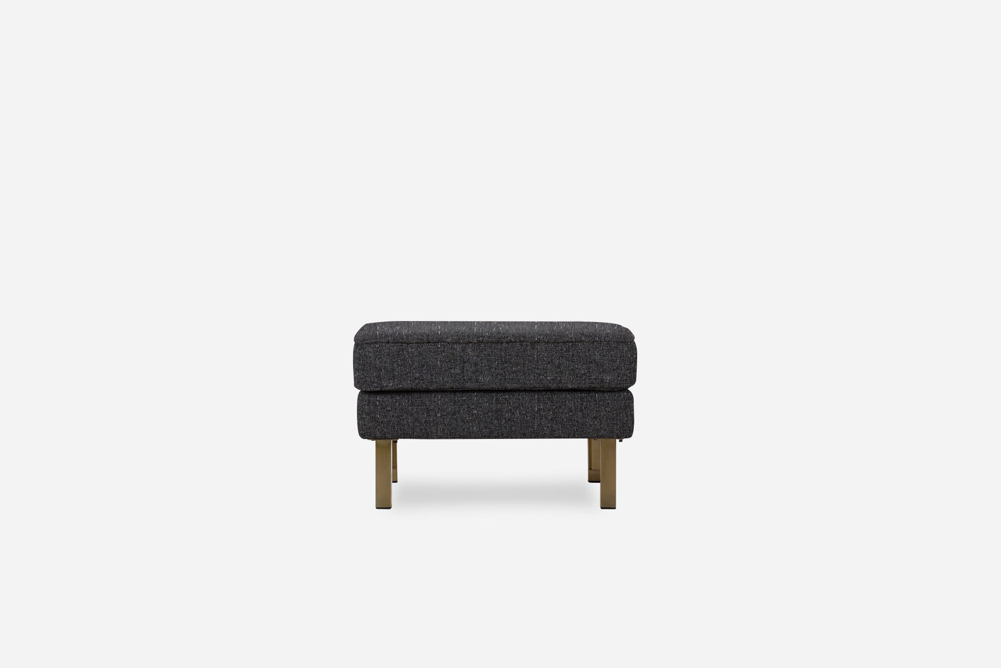 albany ottoman shown in charcoal with gold legs